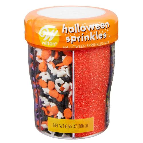 A 6.56-ounce container of Halloween 6-Cell Sprinkles Mix by Wilton. The mix features a variety of sprinkles in six different compartments, including Halloween-themed shapes and colors, perfect for decorating festive treats